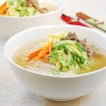 Janchi guksu (Korean banquet noodles) Warm noodle soup with thin wheat noodles