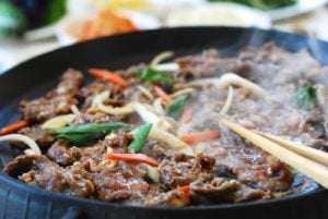 Bulgogi - Korean BBQ being cooked in a grill pan