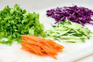 Julienned carrot, cucumber, red cabbage and lettuce
