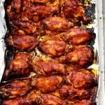 Baked spicy chicken wings in a baking tray