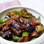 Cubed eggplants with sliced green peppers stir-fried in a gochujang sauce