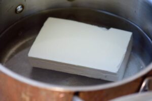 boiling tofu in a pot