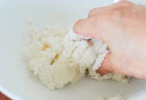 kneading rice for rice balls