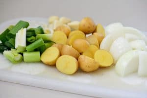 Potatoes, onion, scallions cut up for Korean braised chicken