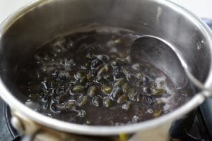 Boiling black soybeans