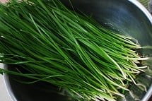 washing garlic chives