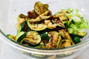 seasoning grilled eggplant and zucchini slices