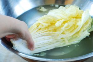 salting napa cabbage for kimchi