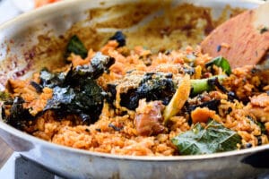 Frying rice in leftover dakgalbi sauce in a pan