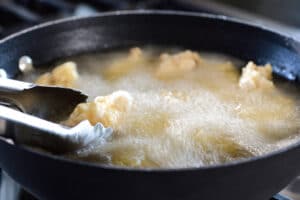 Deep frying chicken wings