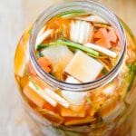 Korean water kimchi in a gallon size jar