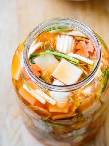 Korean water kimchi in a gallon size jar