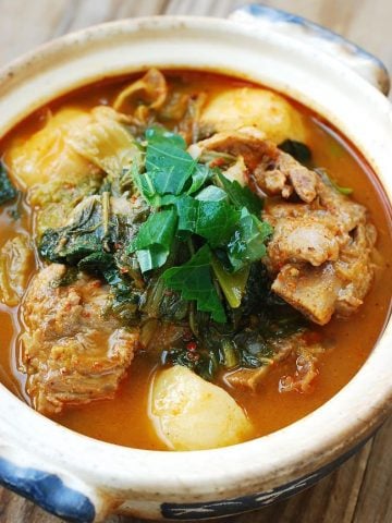 Korean spicy pork bone soup in a small earthenware pot