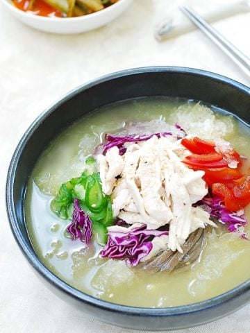 Chilled Korean Chicken Soup served with shredded chicken and vegetables