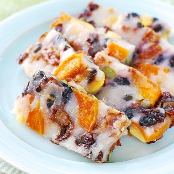 Youngyang chaltteok (Korean Sweet Rice Cake) with nuts and dried kabocha served in a plate