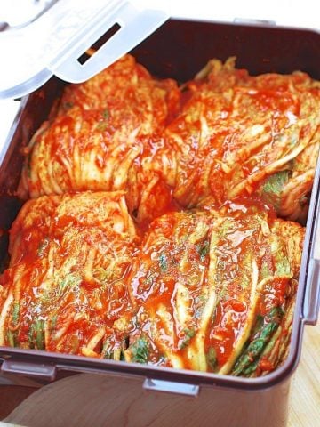 Napa cabbage Vegan kimchi in a brown kimchi container