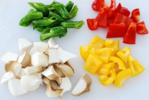 Stir-fried lotus root with peppers and mushrooms