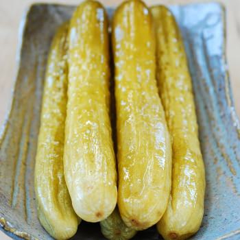The long slender Korean salt pickled cucumbers in a large plate