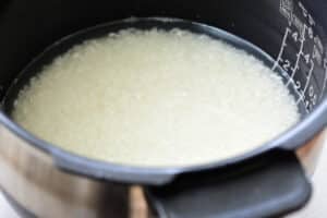 cooking rice in a rice cooker for Korean rice rolls