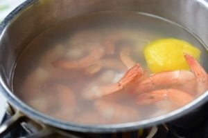 Poaching shrimp in a pot