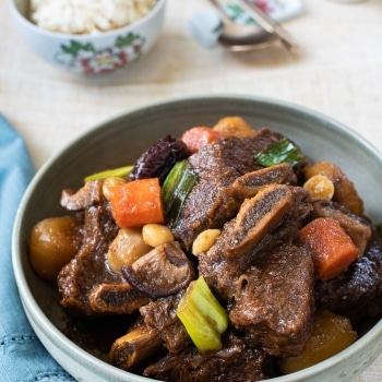 Korean braised beef short ribs served with a bowl of rice