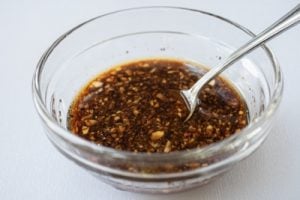 stir fry sauce in a small bowl with a spoon