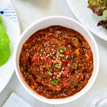 overhead shot of Sauce for Korean lettuce wraps in a small white ball
