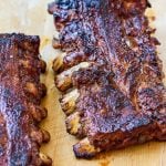 Korean BBQ pork ribs served on a wooden board