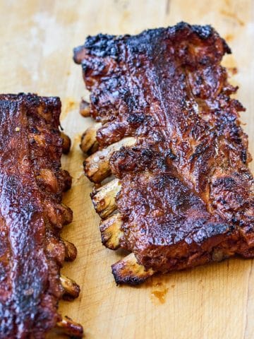 Korean BBQ pork ribs served on a wooden board