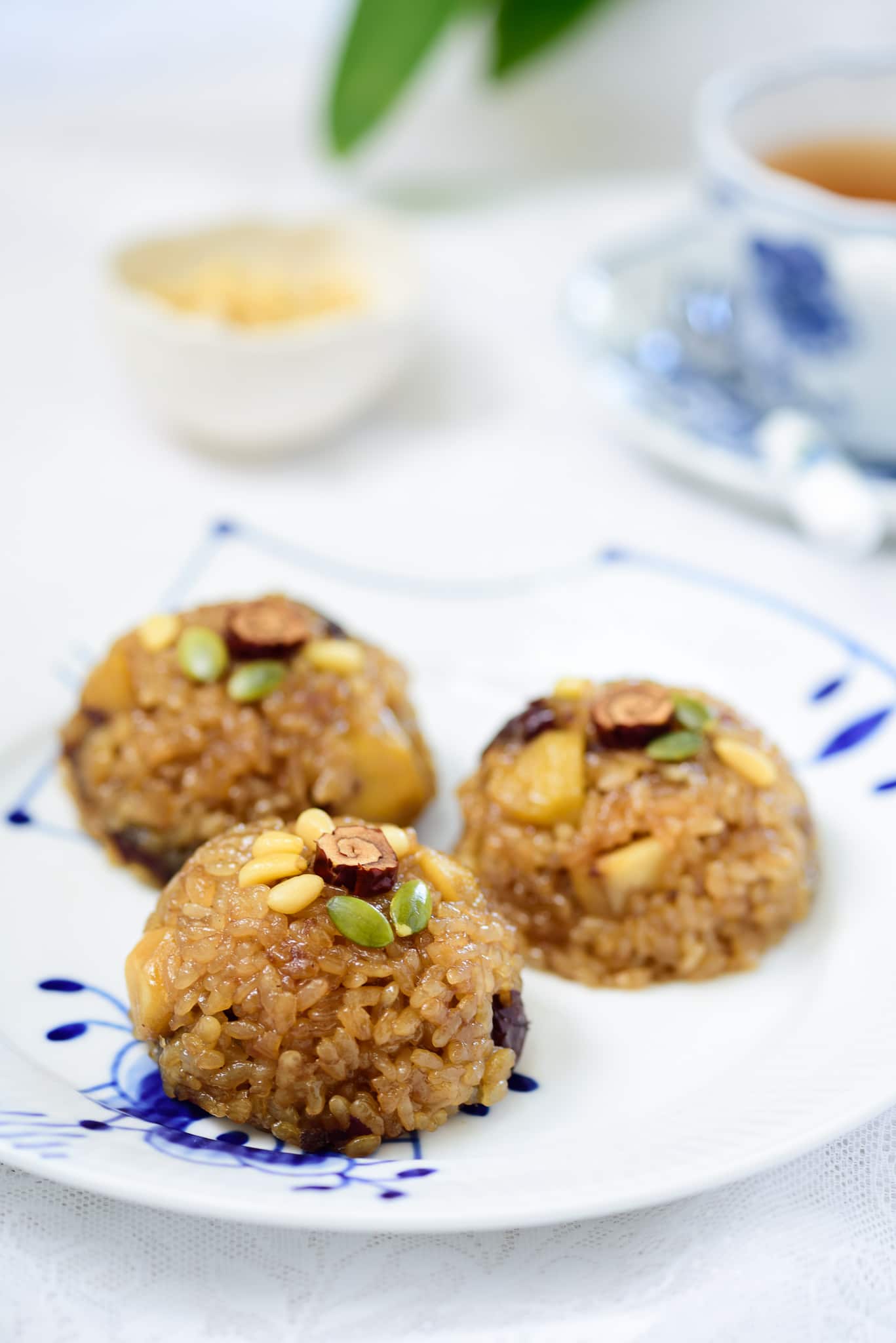 Yaksik, a Korean dessert, sitting on a blue and white plate. 