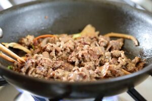 cooking bulgogi in a pan