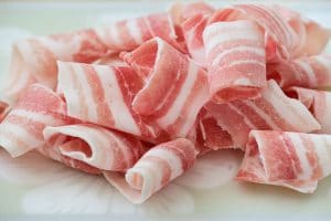 raw thin strips of pork belly