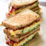 two Korean street egg toasts cut in halves and stacked up