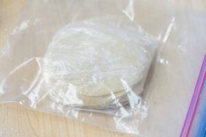 dumpling wrappers in an airtight plastic for storage